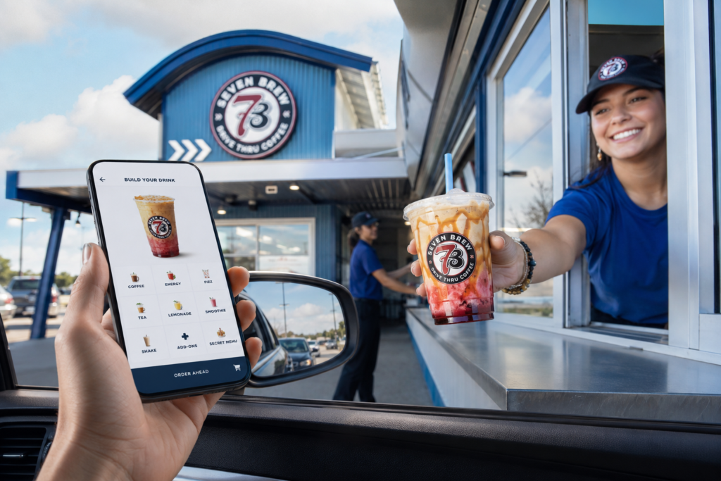 7 Brew barista handing a colorful iced drink to a customer at a drive-thru window, with a smartphone showing the coffee ordering app in the foreground.