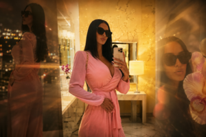 Johanna Leia: Model, Drake’s Ex, and Mom Behind a Landmark NCAA Case Johanna Leia poses for a mirror selfie in a pink wrap dress and sunglasses inside an elegant interior.
