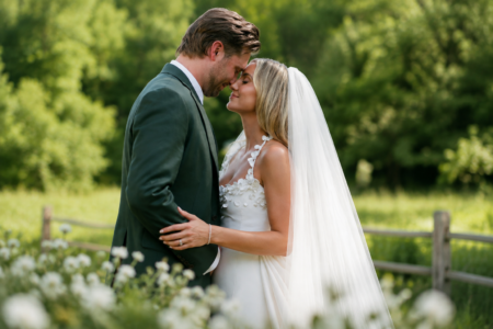 Lainey Wilson Wedding: Inside the Country Star’s Waterfall Cave Ceremony in Tennessee Lainey Wilson and Duck Hodges embracing in a romantic outdoor wedding portrait